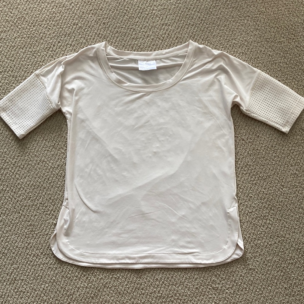 CALIA Carrie Underwood Special Edition Cream Perforated Athleisure Top Like New